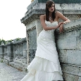 Elegante witte bruidsjurk met stroken